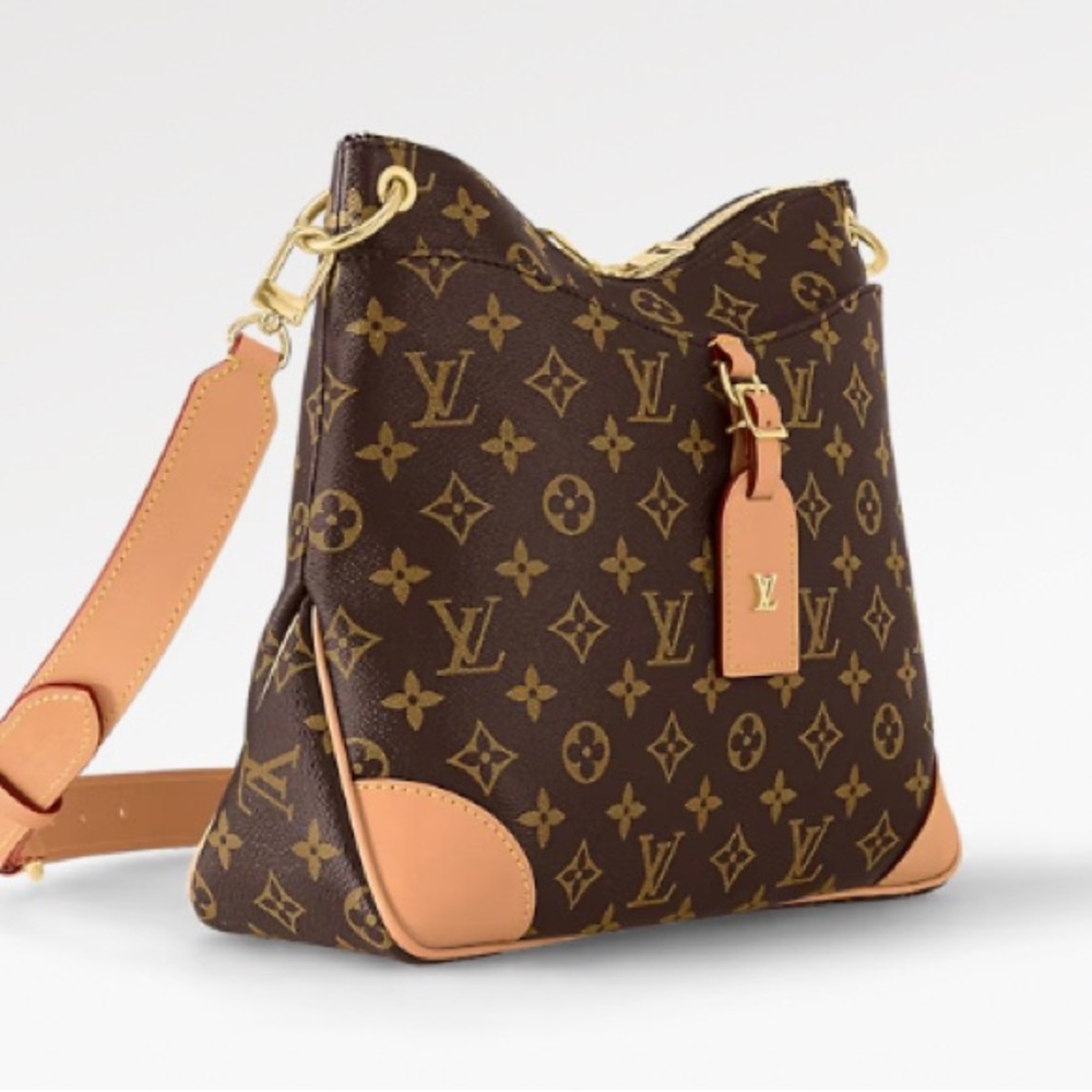 LV Crossbody barely used.  Comes with dust cover